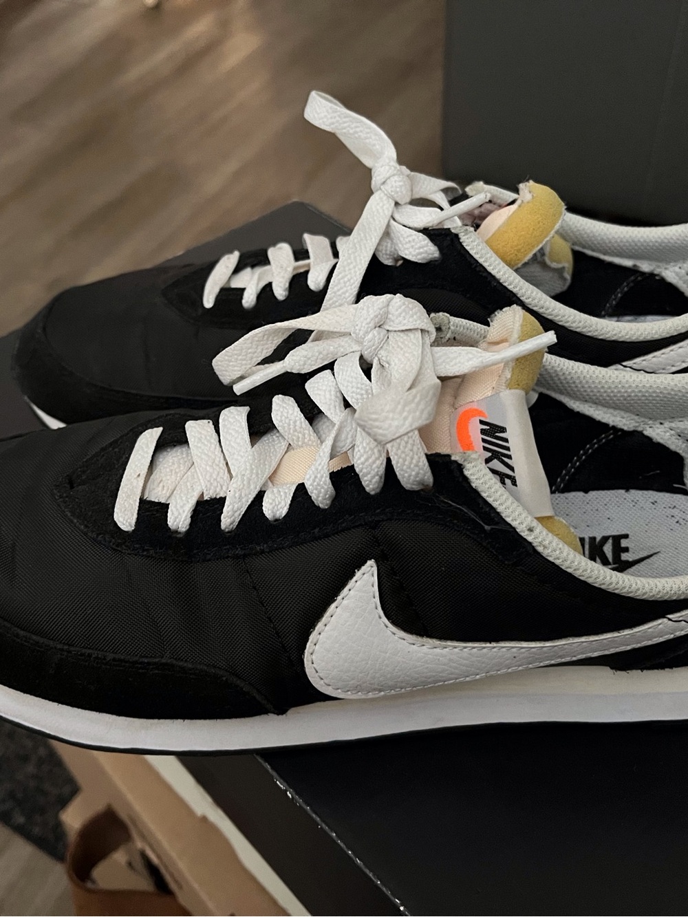 Nike Men’s Black & White Classic Runner with Neon Orange Accent